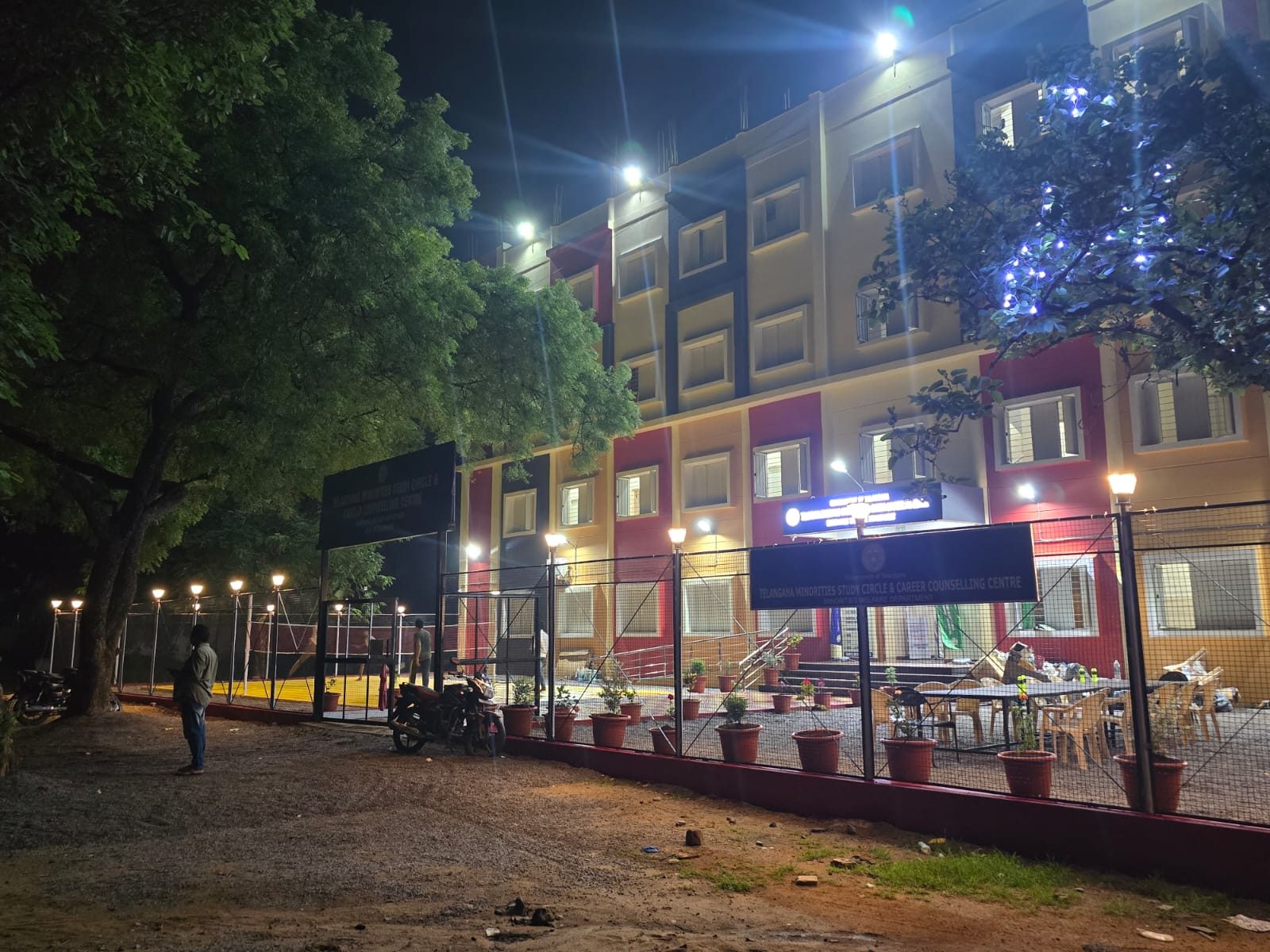 Campus building illuminated in the evening
