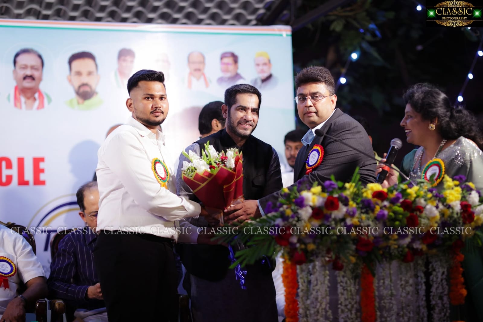 Bouquet presentation on stage at a Study Circle event
