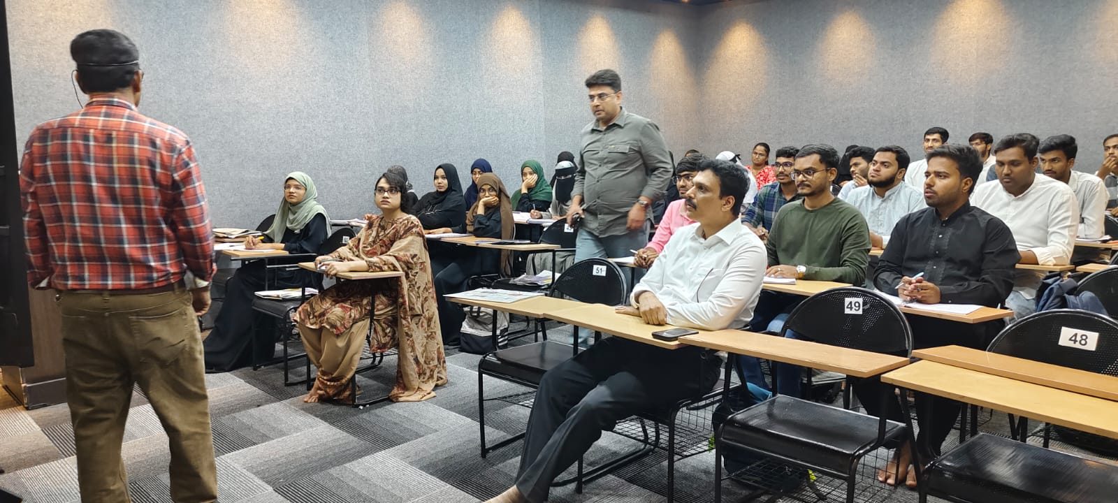 Interactive classroom session with visiting officials
