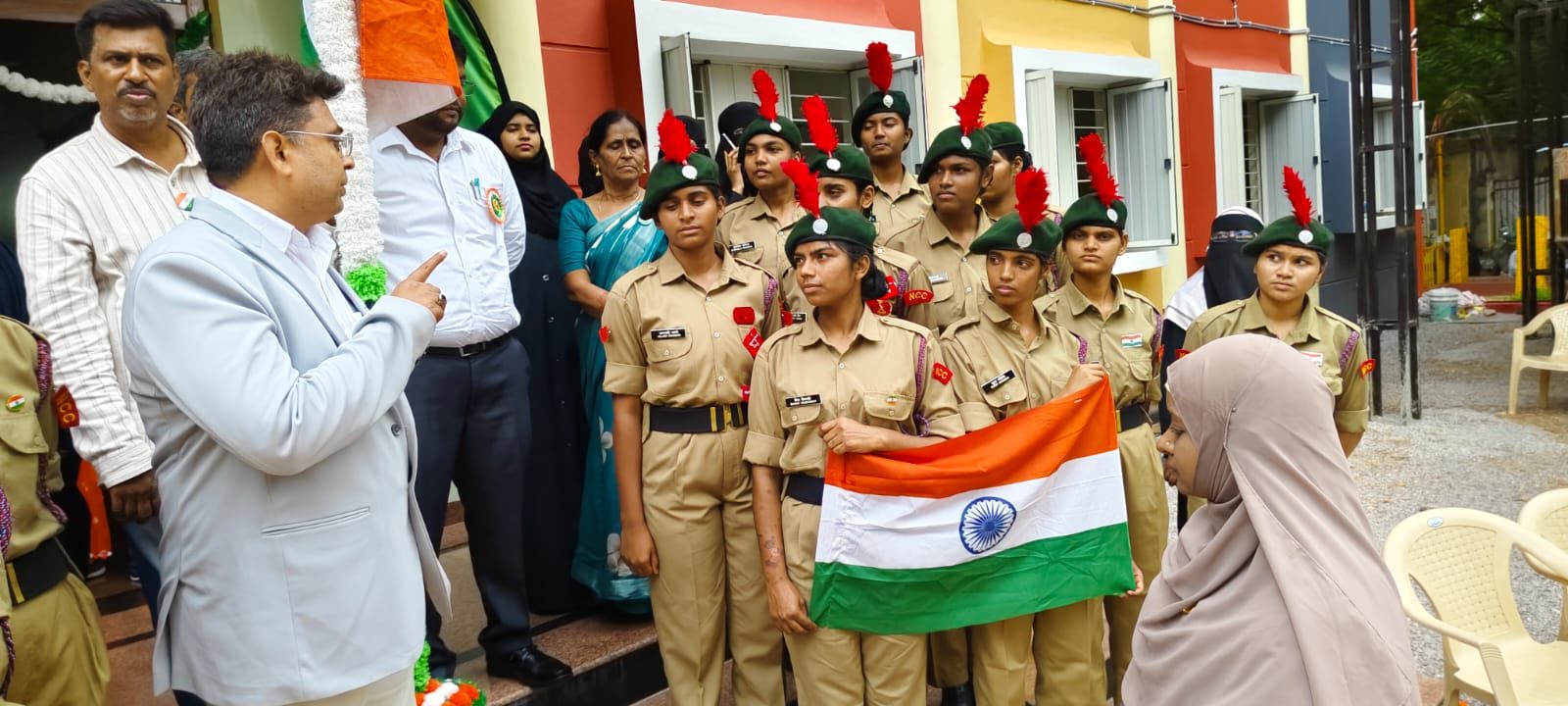 Director interacting with NCC cadets