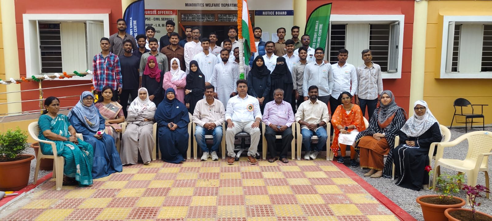 Full group photograph of staff, faculty, NCC cadets and students